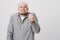 Bald handsome bearded man looking angry showing italian gesture over white background. Private businessman is annoyed