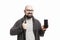 A bald man with glasses shows the phone screen. White background