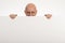 Bald man peeps over top of blank white paper