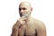 A bald white man prepares to shave his stubble. A man& x27;s face with shaving foam.