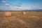 Baled Hay Rolls at Sunset