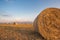 Baled Hay Rolls at Sunset