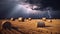 Bales of hay on the field during a lightning storm. Force of nature landscape. Agricultural field with straw bales and lightning