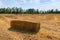 Bales hay panorama landscape sun light strong contrast Po Valley