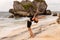 Bali beach yoga. Variation of Hasta Uttanasana, Raised Arms Pose. Boost energy in body. Strong back. Flexible spine. Self-care