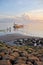 Bali Fishermen Preparing Their Boat at Dawn at Sanur Beach.