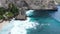 Bali, Indonesia, aerial view of Nusa Penida Island coastline showing limestone rock formations at Diamond Beach