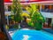 Bali, Indonesia - April 09, 2012: View of swimming pool at The Flora Kuta Bali hotel