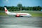 Bali, Indonesia - April 30, 2019: Lion Air plane on Denpasar Airport runway