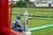 BALI/INDONESIA-DECEMBER 21 2017: A meteorological observer checks the Helman rain meter at meteorology garden to make sure this