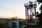 BALI/INDONESIA-JUNE 06 2019: sunrise in the morning at the location of a radar tower that detects volcanic dust at an airport
