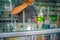 BALI, INDONESIA - MARCH 08, 2017: Man using pipettes for mixing essences to prepare perfumes for the permuse store in