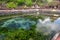 Bali, Indonesia - September 9,2017: People visit Holy water spring in the Pura Tirta Empul, Bali