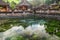 Bali, Indonesia - September 9,2017: People visit Holy water spring in the Pura Tirta Empul, Bali