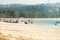 Bali. Jimbaran Beach. Tourists walk along the crowded beach. 18 November 2012