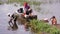 BALI - MAY 2012: people washing clothes, batur danau lake