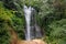 Bali\\\'s Waterfall in Long Shutter Grace, Brown Ground and Lush Greenery