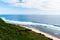 Bali seascape with huge waves at beautiful hidden white sand beach. Bali sea beach nature, outdoor Indonesia. Bali