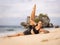 Bali yoga. Attractive woman practicing Anantasana, Sleeping Vishnu Pose. Yoga balance on side. Stretching exercise. Preparation