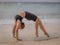 Bali yoga. Caucasian woman practicing Chakrasana or Urdhva Dhanurasana, Full Wheel Pose. Upward facing bow pose is a deep backbend