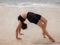 Bali yoga. Caucasian woman practicing Chakrasana or Urdhva Dhanurasana, Full Wheel Pose. Upward facing bow pose is a deep backbend