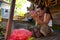 Balinese actor preparing for a dance Barong