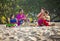 Balinese family prayed in front of Kuta Beach, Bali, Indonesia.