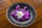 Balinese flower decoration with purple and white flowers