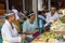 Balinese preparing for temple religious ceremonial offering