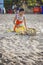 Balinese women prayed in front of Kuta Beach, Bali, Indonesia.