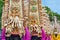 Balinese women in traditional costumes with religious offerings