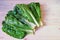 Balkan cuisine. Blitva  chard leaves  - popular leafy vegetables. Rustic background, free space for text