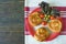 Balkan cuisine. Bureks - popular national dish - on red plate. Flat lay, free space for text