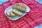 Balkan cuisine. Slices of cornbread on white plate