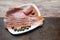 Balkan cuisine . Slices of prsut: dry-cured ham,  Balkan version of prosciutto. Copy space