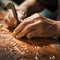 balkans closeup hands of artisan chilseling carving coppy