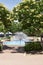 Ball-fountain surrounded by greenery in a park under sunlight in Naperville in Illinois