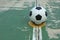 Ball on the middle court at outdoor futsal court