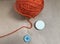 ball of thread for knitting. Blue button and white button. Knitting.