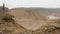 Ballast sand quarry on the cloudy summer day