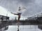 ballerina dances in the rain on the street while walking around the city on a summer day