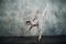 Ballerina female. Young beautiful woman ballet dancer, dressed in professional outfit, pointe shoes and white tutu.