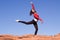 Ballerina girl exercising on the rocks