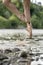 Ballerina jumping in river