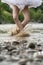 Ballerina jumping in river