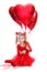 Ballerina like dressed girl sitting with red heart shaped balloons