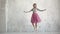 Ballerina in a pink tutu and pointe dance of classical ballet