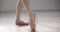 Ballerina, pointe shoes and stretching feet, dance and professional moving. Ballet, woman and legs of creative person in