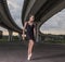 Ballerina posing out of doors. Ballerina dance on a background o