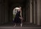 Ballerina posing out of doors. Ballerina dance on a background o